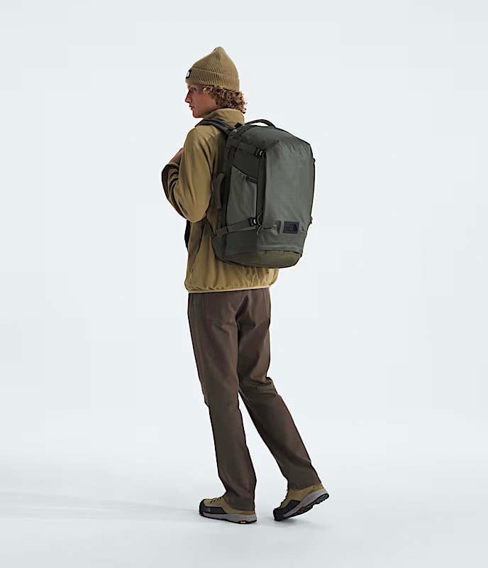 The North Face Backpacks New Taupe Green/TNF Black The North Face Base Camp Voyager Pro Travel Pack - New Taupe Green/TNF Black