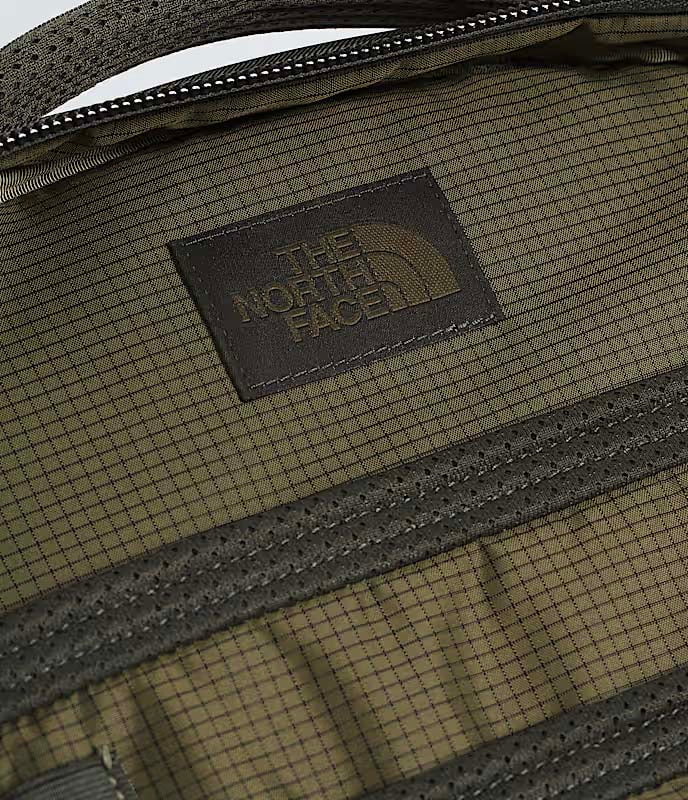 The North Face Backpacks New Taupe Green/TNF Black The North Face Base Camp Voyager Pro Travel Pack - New Taupe Green/TNF Black